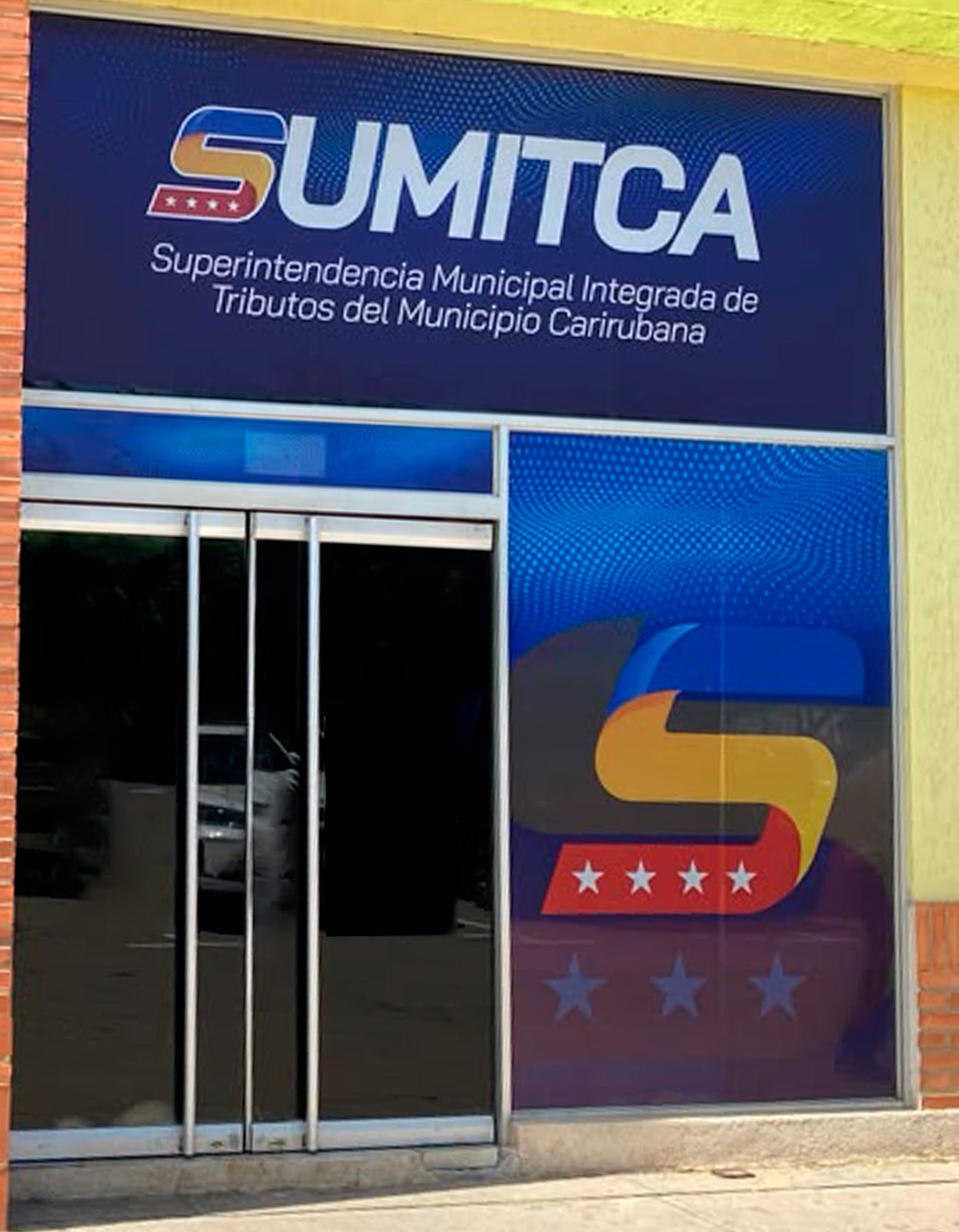 Fachada de la sede SUMITCA